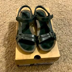 Lightly worn Teva Ventura Cork 2 Rialto womens black sandal, size 8.
